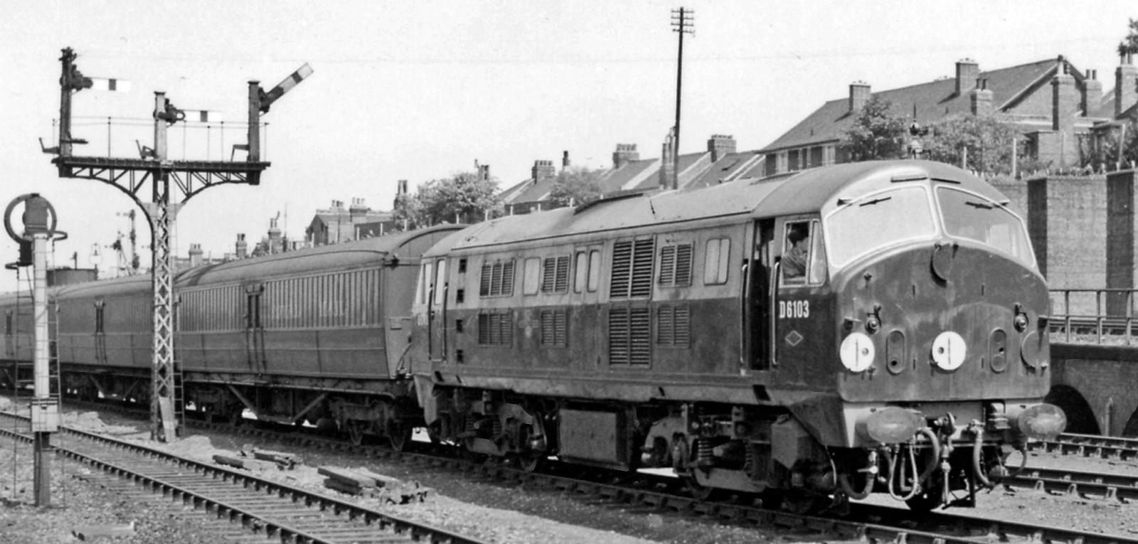 No. 6103 in June 1959 shortly after being delivered with empty mail carriages at Harringay West