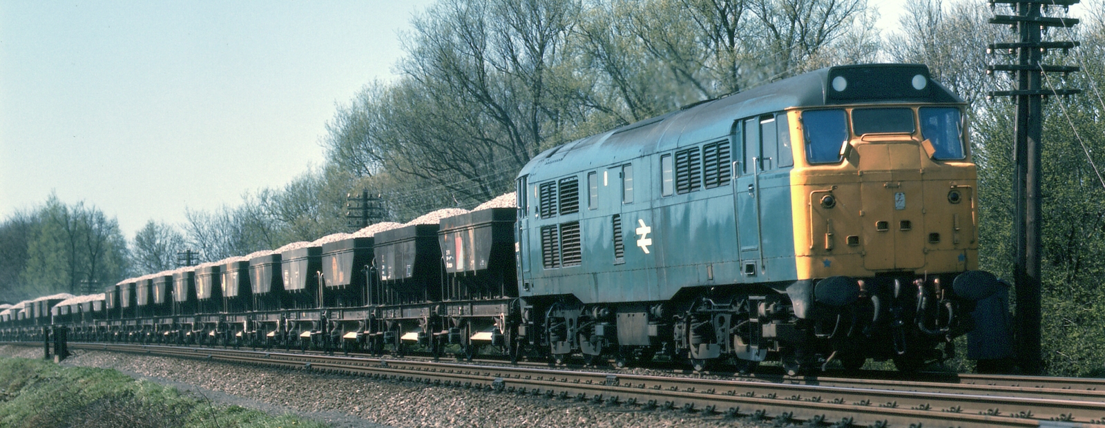 31205 in 1976 with a gravel train in Leicestershire