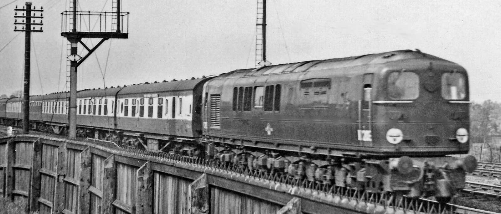 No. 10203 with an express train at Wolverton in May 1957