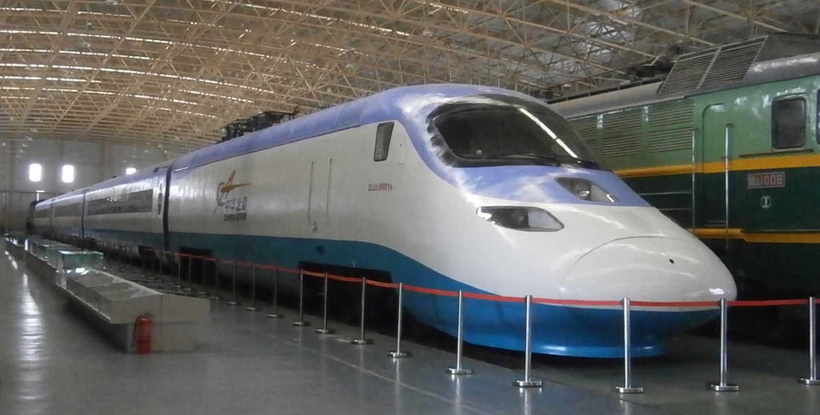 A power car with three trailers at the China Railway Museum