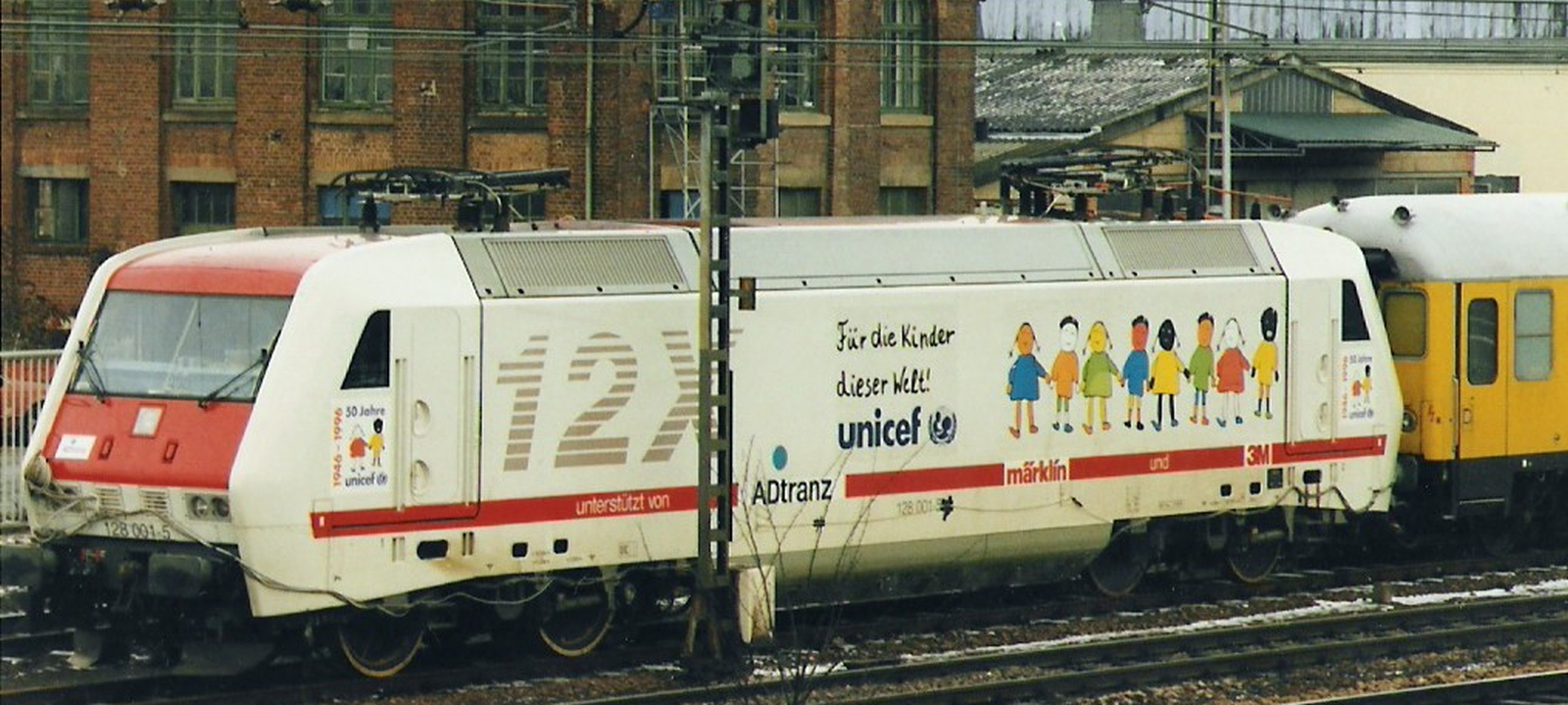 128 001 with UNICEF advertising in February 1996 in Trier