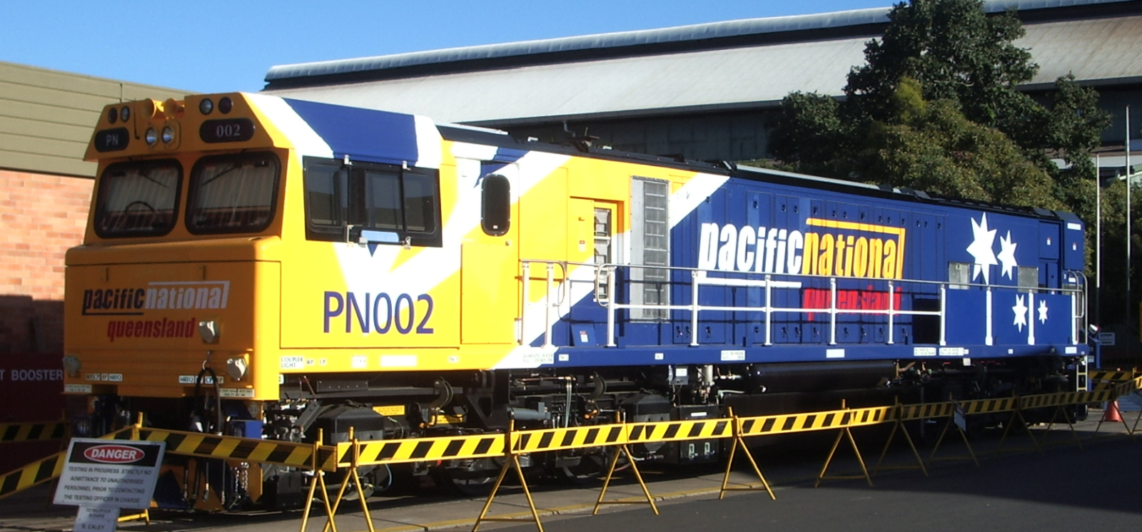 GT42CU as PN002 of Pacific National in November 2004 on delivery at Downer's Maryborough facility