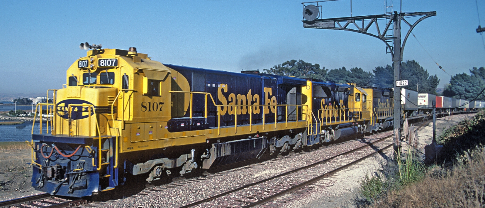 Train with Santa Fe C30-7 No. 8107 in the lead in September 1988 near Gately, California