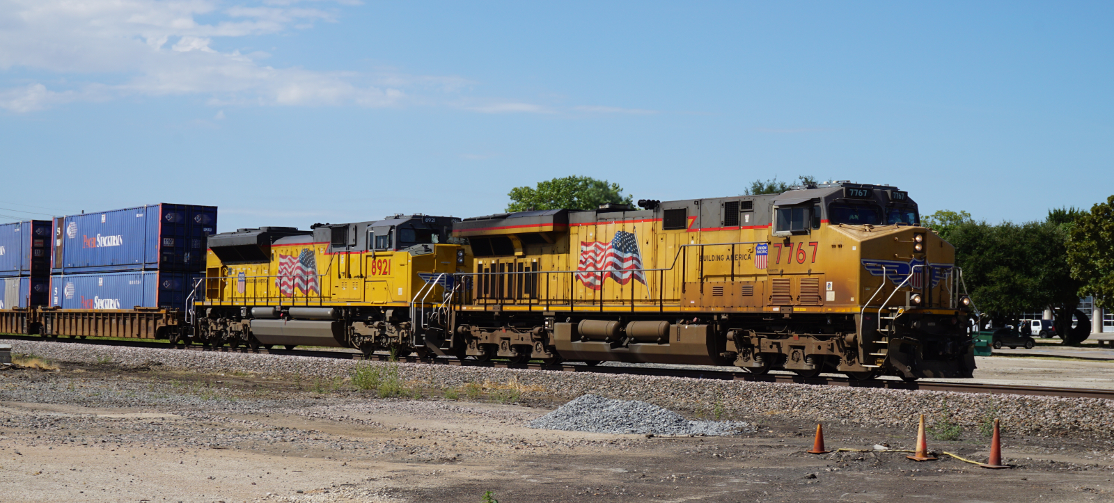 Union Pacific ES44AC No. 7767 in front of SD70ACe No. 8921 on September 12, 2015 in Denton, Texas