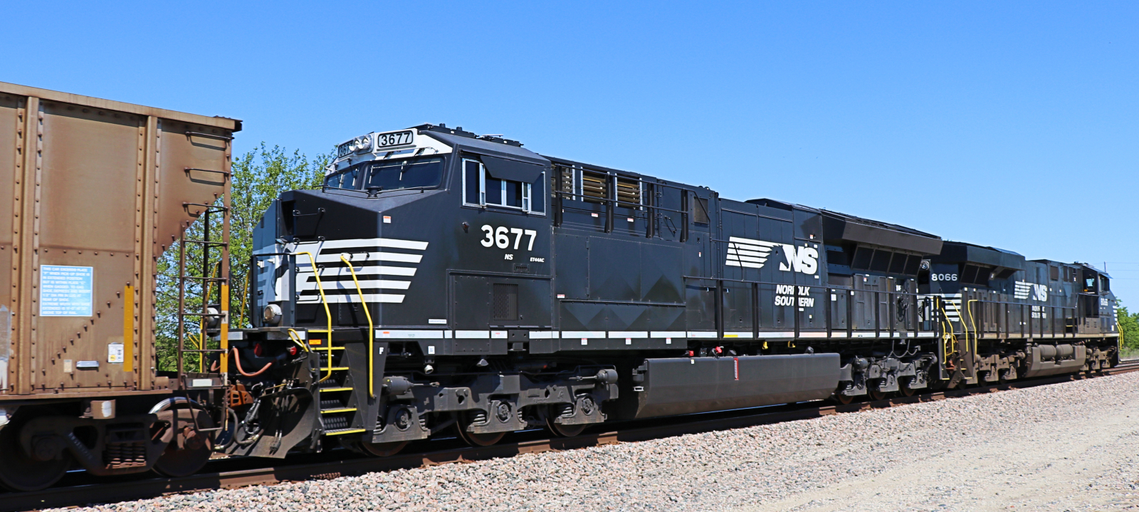 Norfolk Southern's ET44AC No. 3677 behind ES44AC No. 8066 in May 2017 near Spring Hill, Kansas