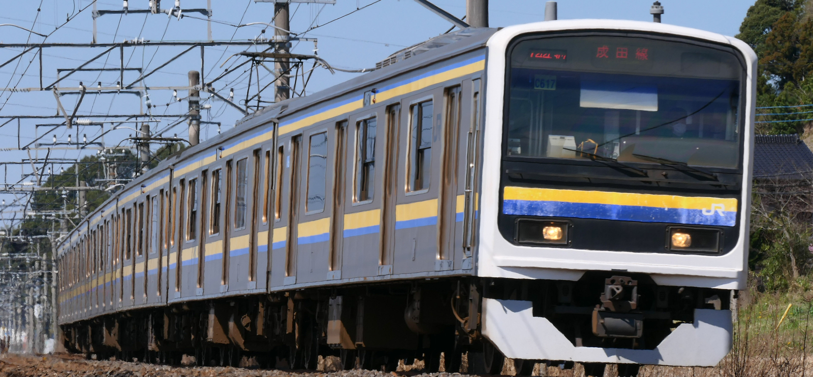 Class 209-2100 train in March 2021 on the Narita Line