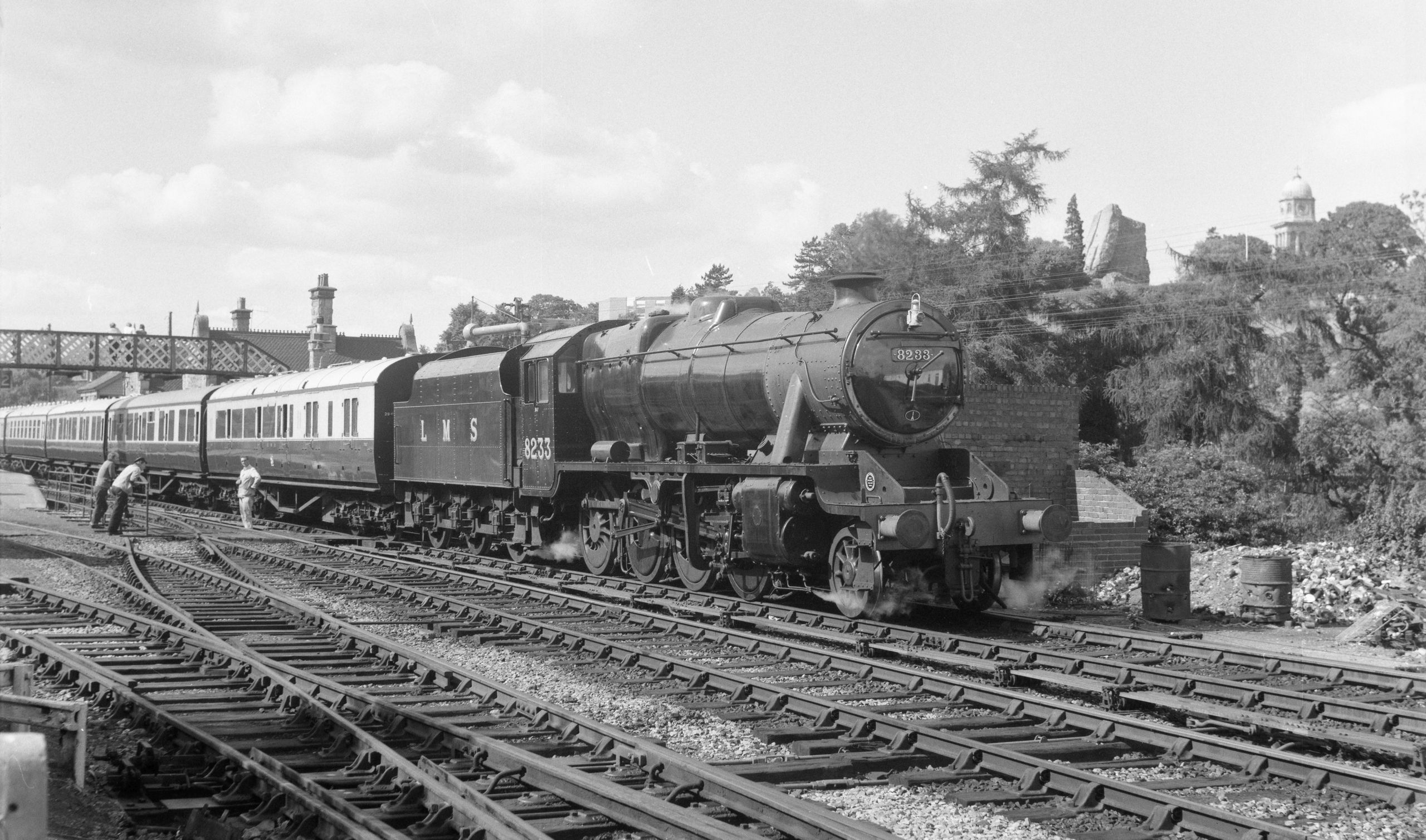 No. 8233, here in passenger service, was used in Iran during World War II and returned to England in 1952
