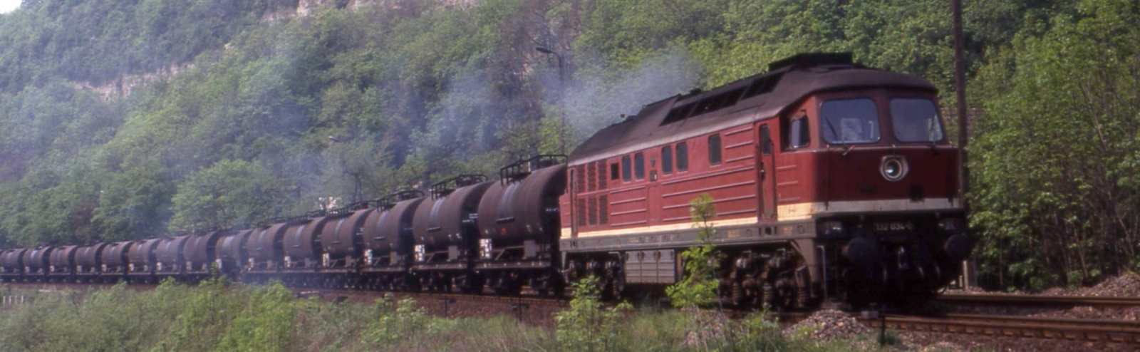132 034-0 with an oil train in May 1990 near Dornburg/Saale